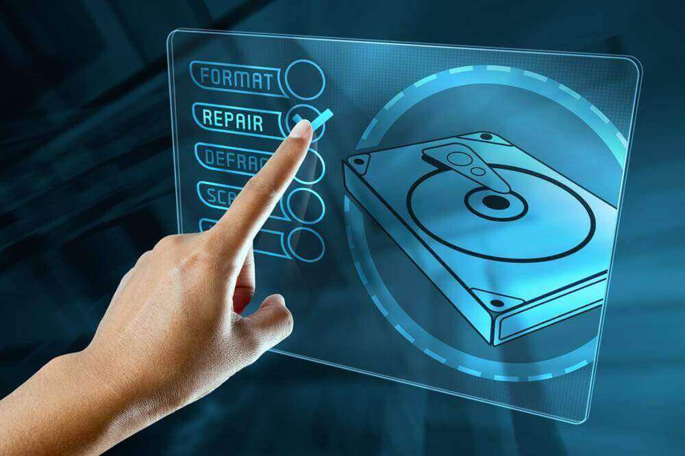 a woman finger choice a option to repair a hard disk on a digital screen